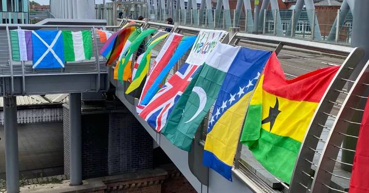 Flags of world in Nottingham city centre in reaction to 'Operation Raise The Colours'