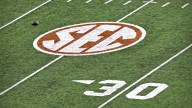 Viral ring girl from Mike Tyson vs. Jake Paul fight reveals which SEC Football coach slid in her DMs