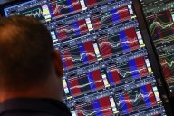 Wall Street rises to more records as Tesla vrooms higher