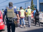 Raid at U.S. battery factory forces Koreans into 'vacation'