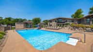 This Madrid, Iowa home for sale has a stocked pond for fishing