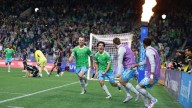 Sounders and Whitecaps play to 2-2 tie; Seattle clinches playoff spot and Vancouver move into 1st