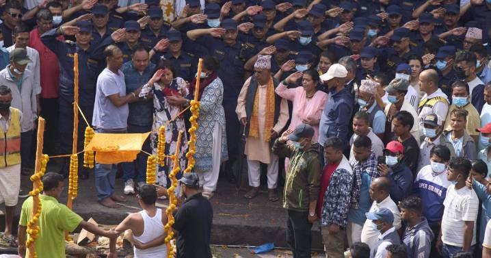 Nepal's president appoints former chief justice as interim premier and first woman leader