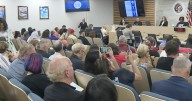 School board meeting draws crowd over teacher removals