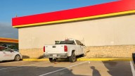You can't park there! Truck drives into Texas gas station