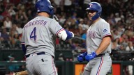 Osuna's 2-run single in 10th inning pushes Rangers past Diamondbacks 7