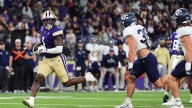 Jonah Coleman sets career high with 5 rushing touchdowns, Washington trounces UC Davis