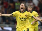 Timeless Modric opens AC Milan account with winner against Bologna