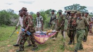 Exhumation in Kenya cult site paused to allow DNA sampling on 34 bodies