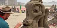 Sculptors create fleeting masterpieces at Seaside SandFest