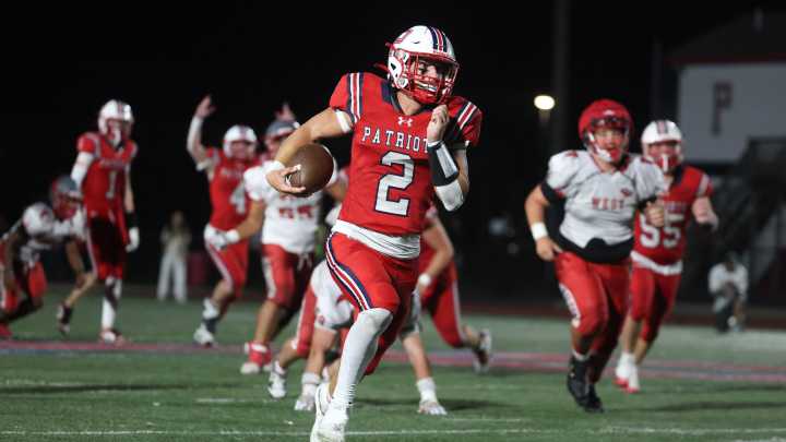 Portsmouth's Jackson Hackley hauls in a 23-yard touchdown vs. Westerly