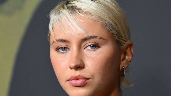 Iris Law steals the show on the red carpet in fitted leather outfit as she supports her dad Jude