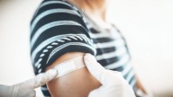 Health insurers' associations says member plans will still cover vaccines