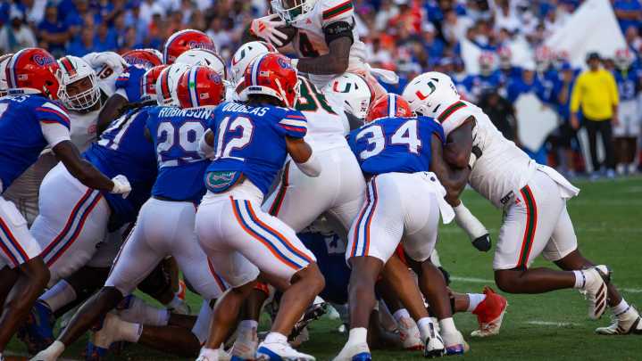State college football wrapup: UM slays UF; UCF dispatches UNC
