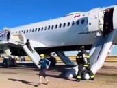 Slides used after Toronto-bound Air Canada flight returns to Denver