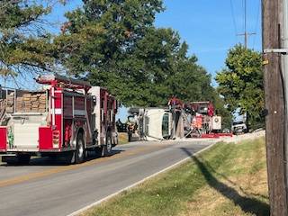 Traffic Alert: Dump truck overturns, shuts down major road
