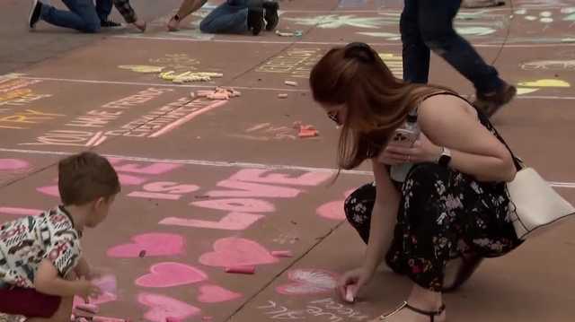 Protesters chalk Orlando City Hall sidewalks in fight for queer visibility