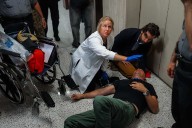 Federal agents grab and shove journalists outside NYC immigration court, sending one to hospital