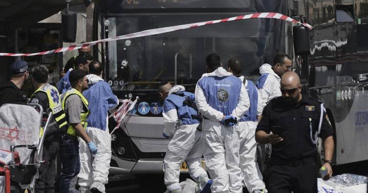 Palestinian gunmen kill 6 people in attack on Jerusalem bus stop