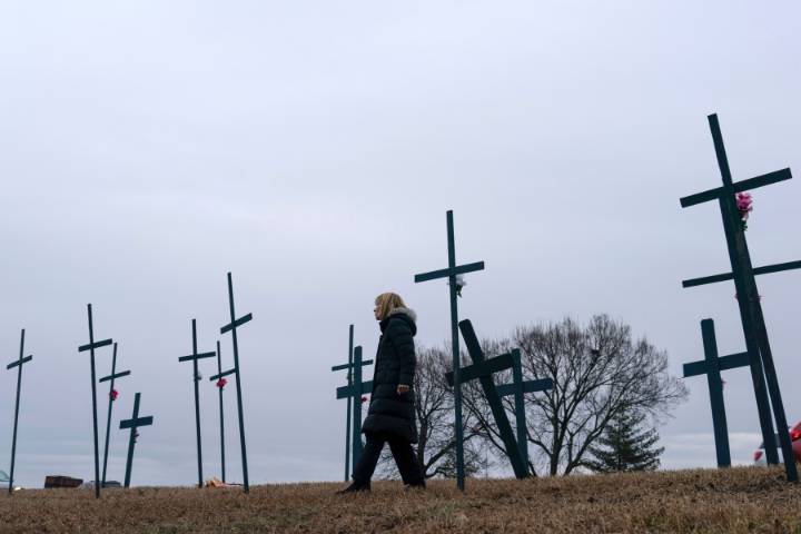 Family of 1 of the 67 Washington plane crash victims sues the FAA, Army and American Airlines