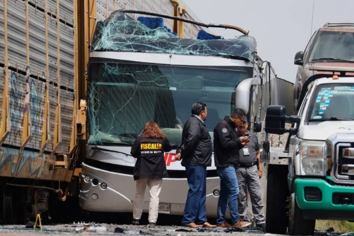 Freight train slams into a bus outside Mexico City and kills at least 10 people