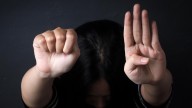Store worker recognizes domestic abuse victim's hand signal, calls for help