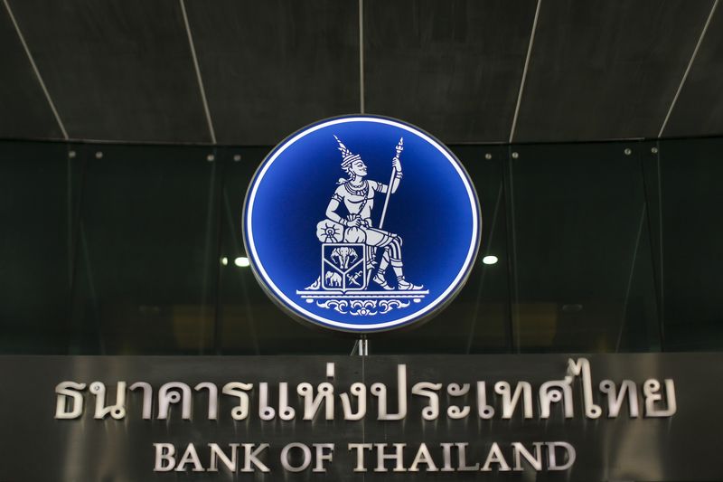 Thailand central bank previous cuts rates to ease financial strain