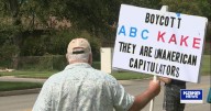Protesters gather outside KAKE News Sunday over Jimmy Kimmel suspension