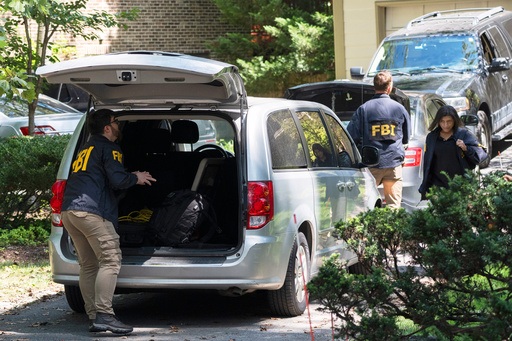 FBI seized phones, computer equipment, folders during search of Bolton's home, records show