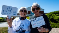 Protesters denounce Trump policies at Labor Day demonstration in Stow