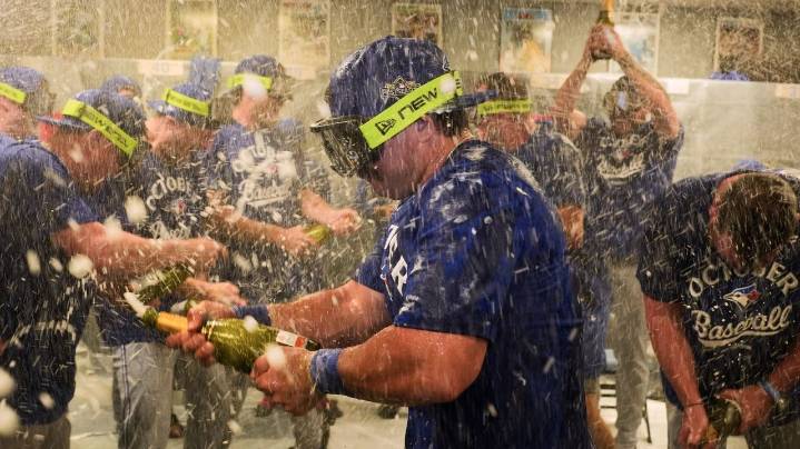 Blue Jays are 1st AL team to clinch playoff spot; best record in league, East title still in play