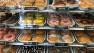 Chocolate-glazed doughnuts return to Krispy Kreme. How to get 50% off