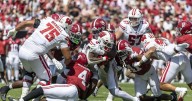 Wisconsin hamstrung by its uncharacteristic struggles in establishing a rushing attack