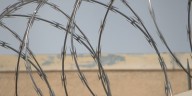 Kansas deputy charged with murder after kneeling on inmate’s back