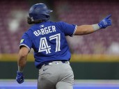 Blue Jays' booming bats come alive with five homers to stage comeback win over Reds