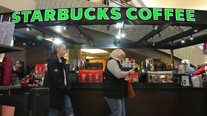 Starbucks to close hundreds of stores, lay off 900 workers as part of turnaround plan