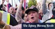 ‘Celebrating murder’: Far-right protest turns violent as Musk blames the left for Charlie Kirk’s death