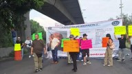 Bloqueo parcial en la autopista México-Querétaro por la desaparición de un joven