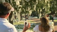 Father and daughter celebrate Auburn win by rolling Toomer's Corner