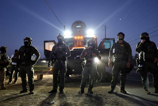 Feds charge 3 with doxing ICE agents