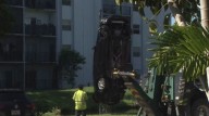 Car pulled from canal near Plantation condos; unclear if anyone hurt