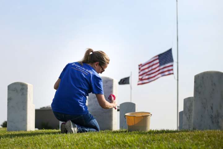Volunteers make efficient work of beautifying Fargo National Cemetery on Patriot Day
