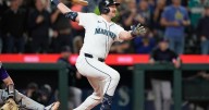 Cal Raleigh hits MLB-leading 59th and 60th homers to help the Mariners wrap up AL West