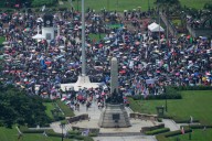Dozens arrested and hurt in clashes with police near Philippine presidential palace
