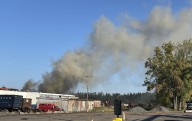 Large fire at metal recycler burning in DeWitt; smoke can be seen for miles