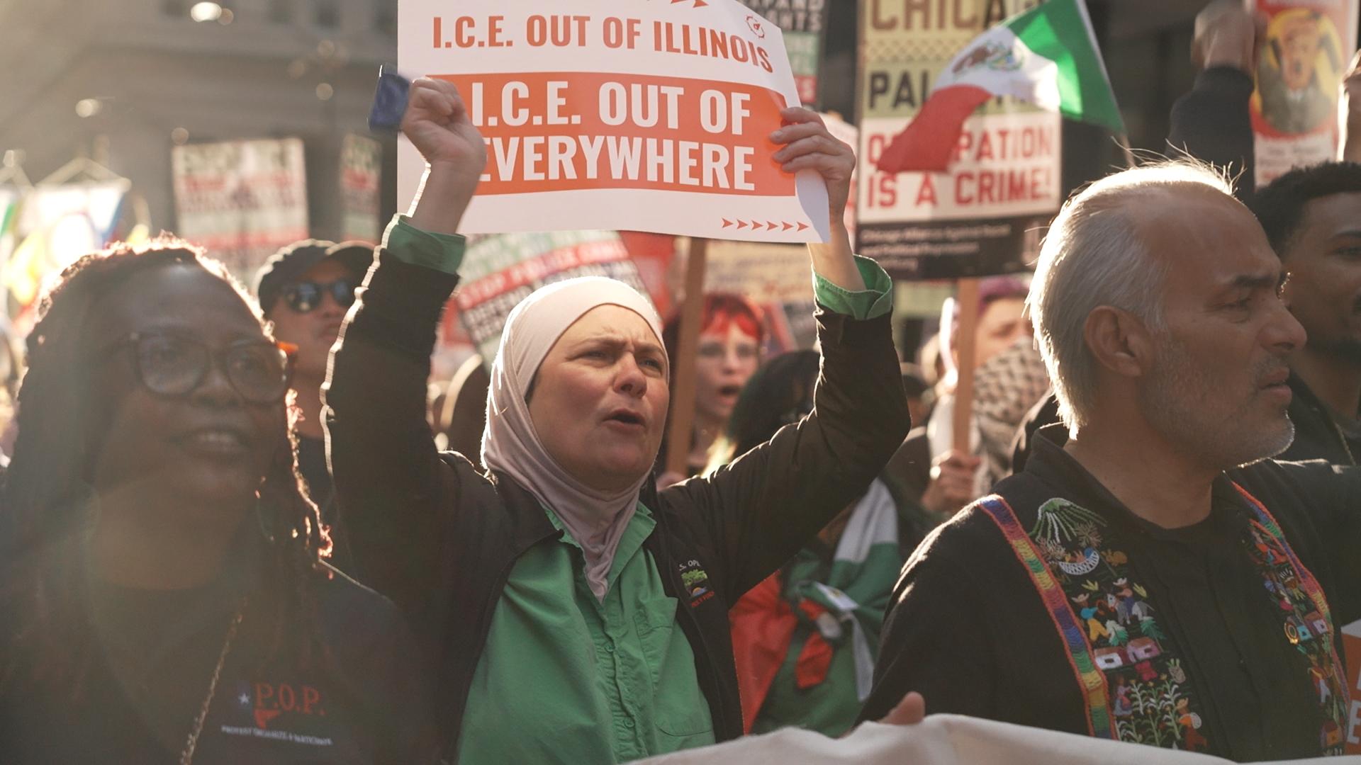 Chicago residents march in defiance of Trump threats