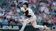 Woo strikes out 13 as Mariners beat Angels 5
