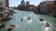 Tourists fined and banned from Venice for swimming in canal