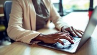 US economy added 911,000 fewer jobs than previously reported
