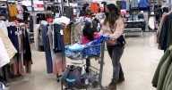 Despite warning signs in the economy, Americans are still spending